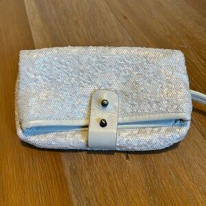 Max Azria white sequin and leather wristlet clutch